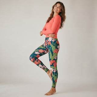 Women's UPF swim leggings, floral print, modest swim options for ladies, sun protection swimwear, surf leggings, paddle board swim pants.